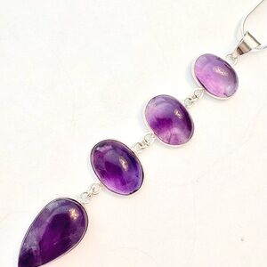 Large , natural 4 stone, 4 inch,  Amethyst pendant on a silver chain.